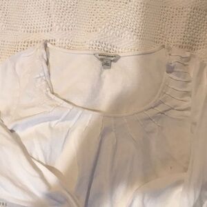 White ribbed T-shirt type blouse with 3/4 length sleeve